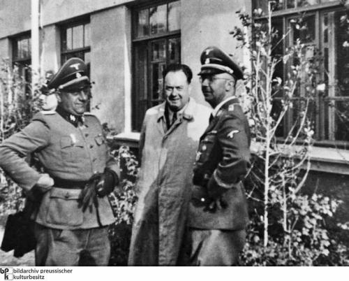 This image shows Himmler at right and Felix Kersten in the middle